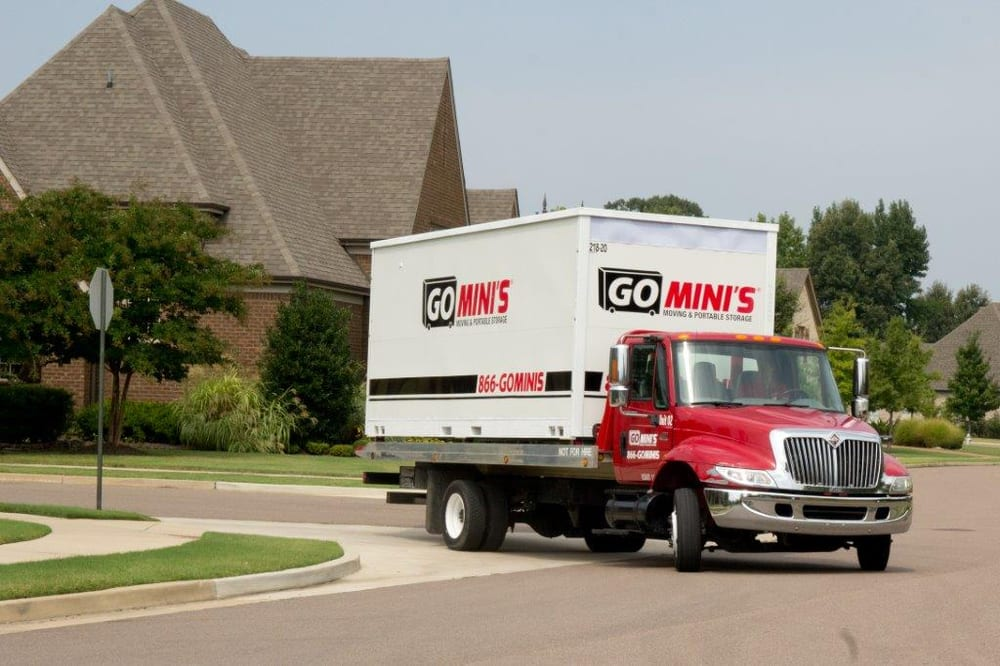 Go Mini's truck driving through suburb 